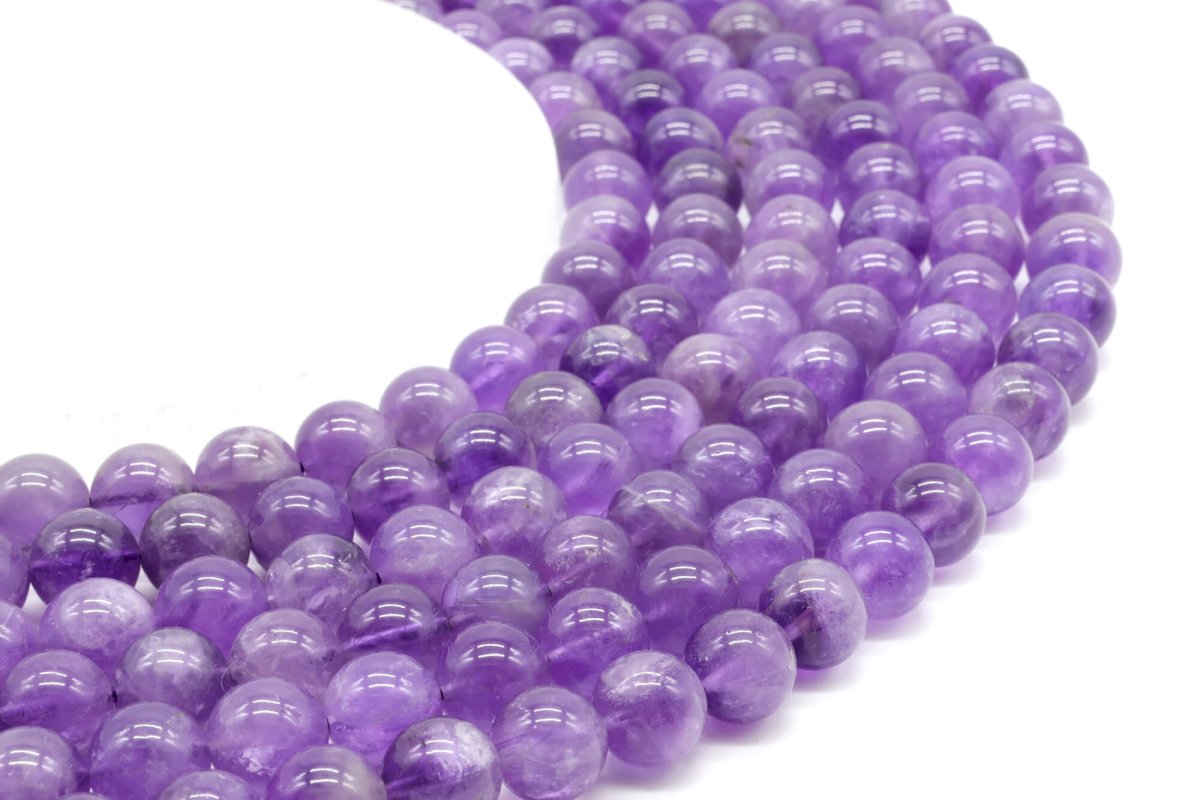Perles Améthyste 'Purple Light' 10mm sur fil 40cm
