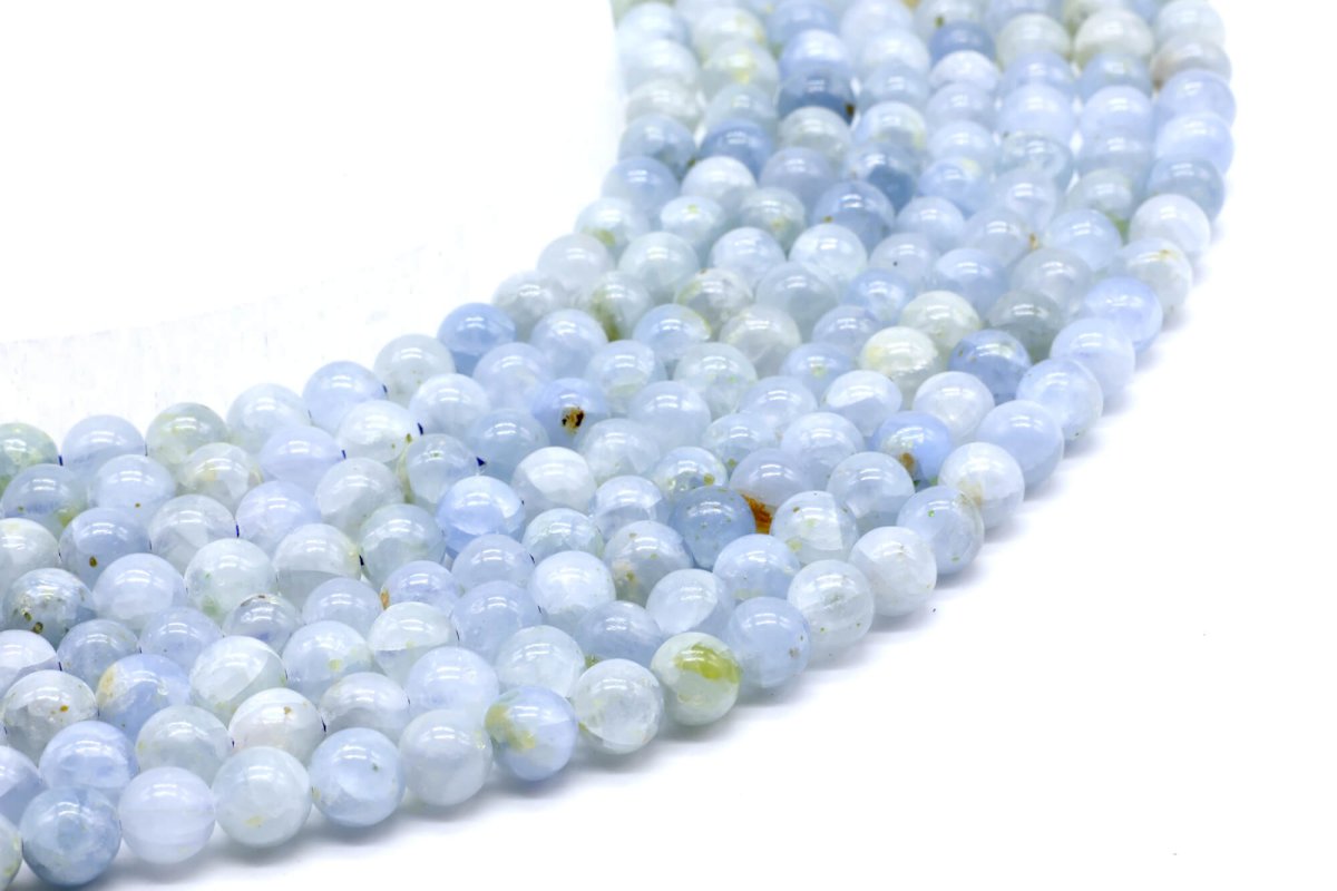 Perles Celestine 'AA' 6mm sur fil 40cm