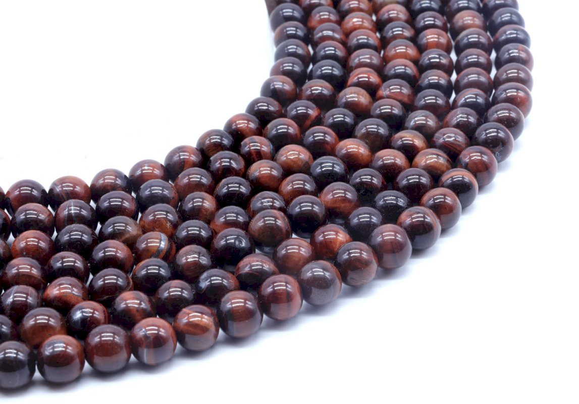 Perles Oeil de Taureau 8mm sur fil 40cm