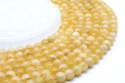 Perles Calcite Orange 8mm sur fil 40cm