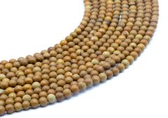 Perles Bois Fossile 4mm sur fil 40cm